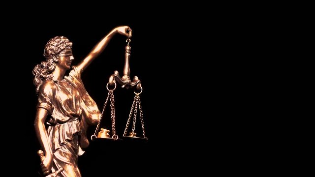 Themis, symbol of law with a measuring scale.