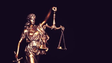 Themis, goddess of law, with measuring scale.