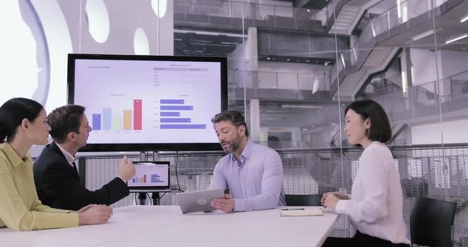 Board meeting looking at sales performance presentation