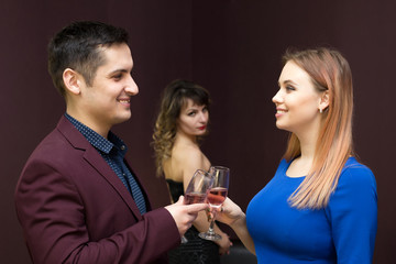 Two friends share a man.  The girl is jealous of a young man to another woman.