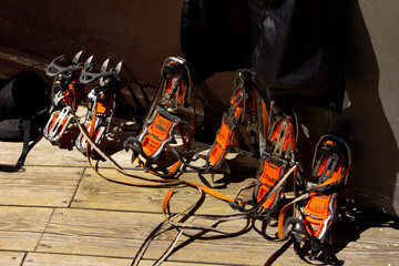 removed equipment for mountaineering on a wooden background