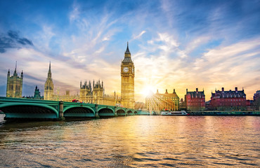London cityscape with Big Ben and City of Westminster Abbey bridge in sunset light, in United Kingdom of England