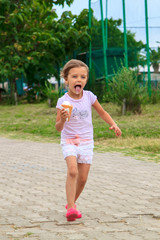 girl eating ice cream on vacation