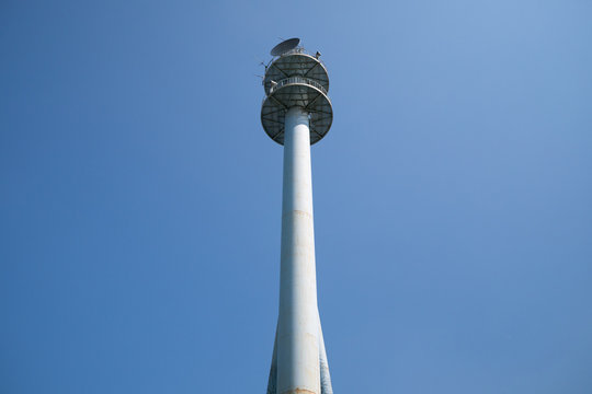 An antenna tower in the sky
