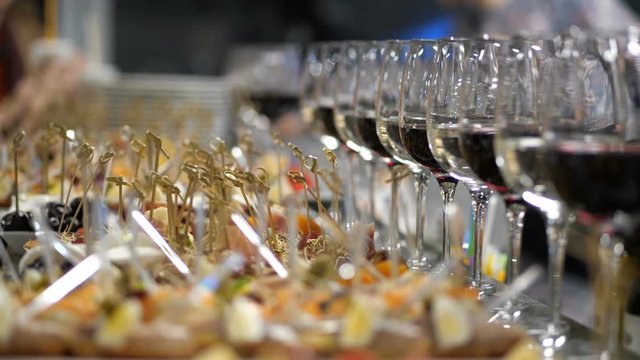 Many frames in one file. Beautiful buffet table with appetizers and wine. 4K Slow Mo