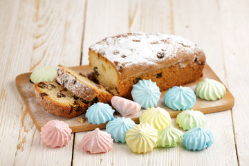 Delicious homemade cake with raisins on a light wooden background. close-up. rustic. copy space.
