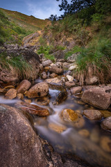 Silk effect of the water of a beautiful waterfall in a river. Pontevedra, Galicia, Spain. 