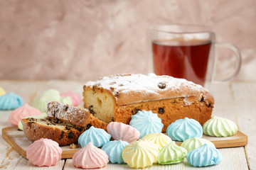 Delicious homemade cake with raisins on a light wooden background. close-up. rustic. copy space.