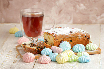Delicious homemade cake with raisins on a light wooden background. close-up. rustic. copy space.