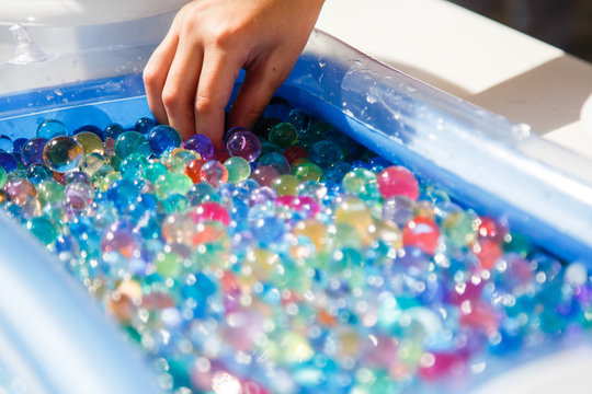 Child Playing With Colored Glass Ball, Playing Game With Colored Balls,