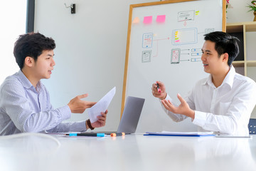 Young man designers planning work together on website ux app development.