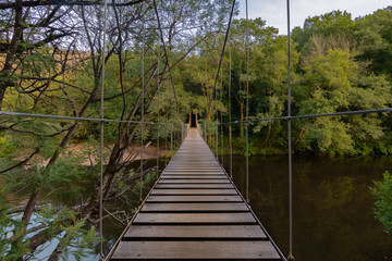 Fototapeta premium Suspension bridge, Crossing the river in Soutomaior, Pontevedra, Galicia, Spain.