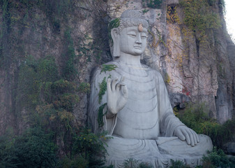 Fototapeta na wymiar Grottoes and Buddha statues in Songcheng, Hangzhou City