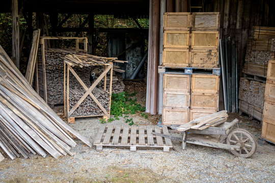 Barn with different wood materials and old equipment