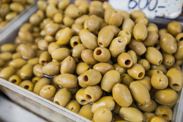 fresh healthy green and black olives for sale