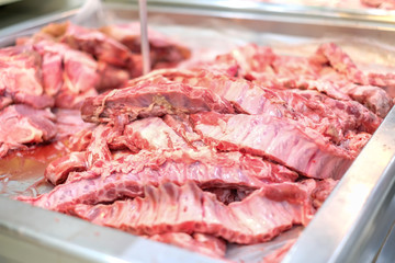 Close-up. Raw pork in department store.