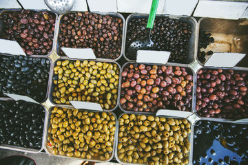 fresh healthy green and black olives for sale