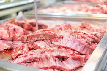 Close-up. Raw pork in department store.