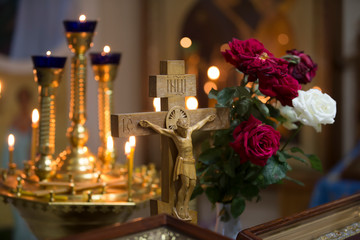 Wooden cross with jesus. Decorated Church Altar