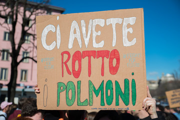 Italian poster saying "you have broken our lungs" during a street protest for the climate change, fridays for future