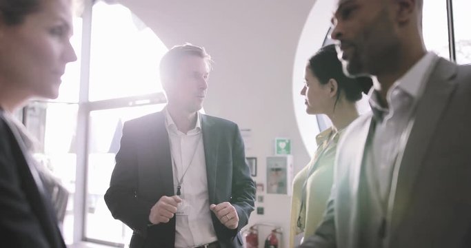 Business Executives Meeting At A Networking Event