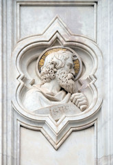 Fototapeta na wymiar Isaac, relief on the facade of Basilica of Santa Croce (Basilica of the Holy Cross) - famous Franciscan church in Florence, Italy