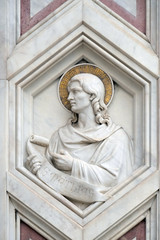 Saint Matthias, relief on the facade of Basilica of Santa Croce (Basilica of the Holy Cross) - famous Franciscan church in Florence, Italy