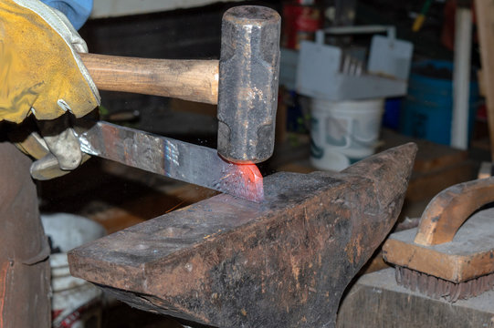 A look inside the workings of a blacksmith shop. Bokeh background.
