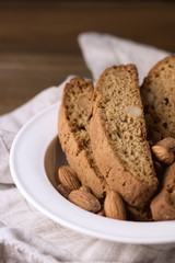 Tasty Traditional Italian Sweets Biscotti or Cantucci on White Plate Wooden Background Italian Biscotti for Coffee or Wine Italian Snack