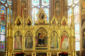 Fototapeta na wymiar Madonna with the Child and the four Doctors of the Church - Polyptych of the high altar in the Basilica di Santa Croce (Basilica of the Holy Cross) - famous Franciscan church in Florence, Italy