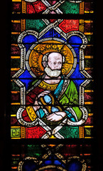Catholic Saint, stained glass window in the Basilica di Santa Croce (Basilica of the Holy Cross) - famous Franciscan church in Florence, Italy
