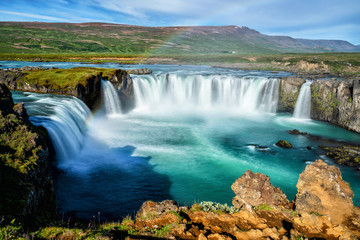 The Godafoss (Icelandic: waterfall of the gods) is a famous waterfall in Iceland. The breathtaking landscape of Godafoss waterfall attracts tourist to visit the Northeastern Region of Iceland. - obrazy, fototapety, plakaty