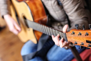 Fototapeta premium Playing a guitar