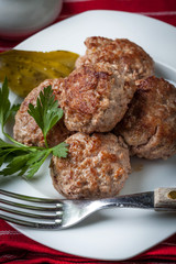 Meatball with parsley.