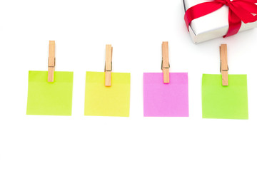 Wooden clips,Clothespin Sticky notes and White gift box isolate on white background concepts