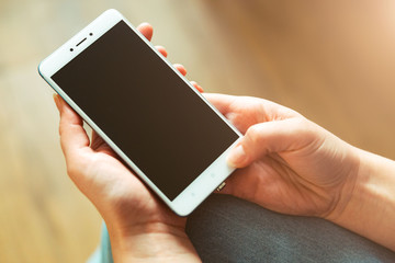 Girl in jeans with phone . Lifestyle. Mobile