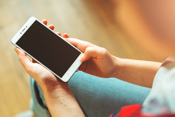 Girl in jeans with phone . Lifestyle. Mobile
