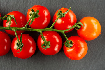Top view of cherry tomatoes looking ripe and wet