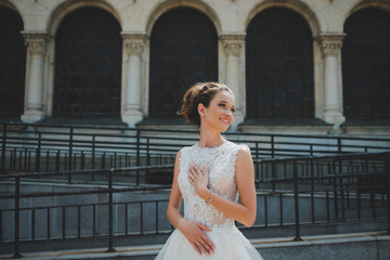 Bride in front of an old building