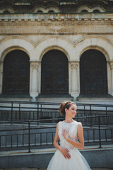 Bride in front of an old building