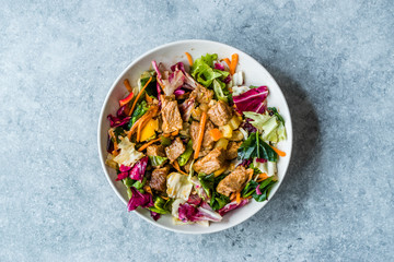 Fresh Salad with Cubed Meat Pieces in Bowl.