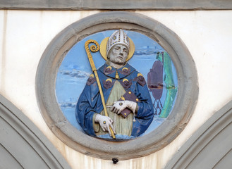 St. Bonaventure, glazed terracotta tondo by Andrea della Robbia, located between two arches of the old Ospedale di San Paolo, in Florence, Italy