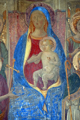 Madonna Enthroned, fresco by Francesco Fiorentino, corner of Via della Scala and Piazza Santa Maria Novella in 1420, in Florence, Italy