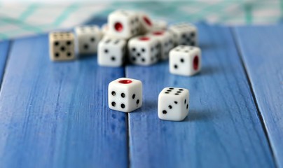 game dice on blue background