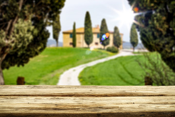 Desk of free space and Tuscany landscape 