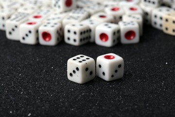 game dice on a black background -