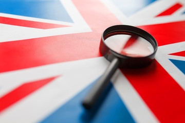 UK flag looking through a magnifying glass. The study of the history and culture of the people of...