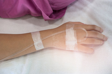 Focus on of a woman patient in hospital .Treatment on patient concept