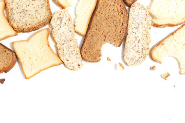 Set of several slices of different bread on a white background.