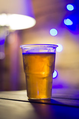 plastic Cup of bear with bokeh